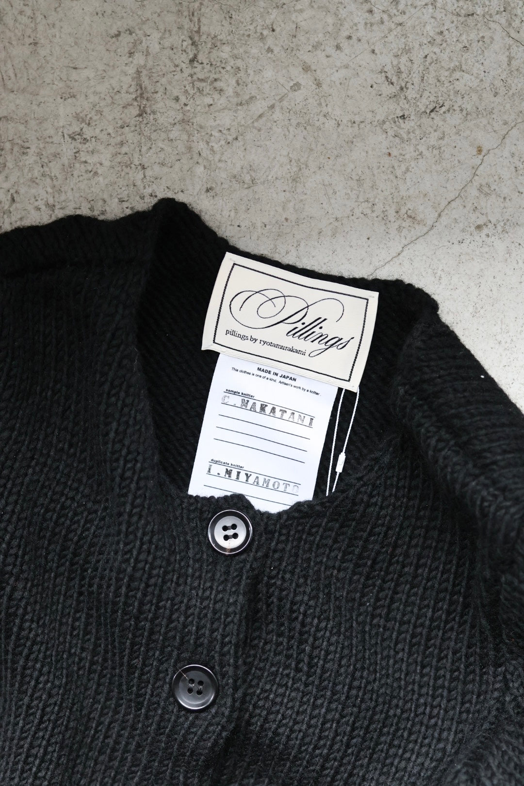 Pillings "Cardigan with unstable sleeves" (black)